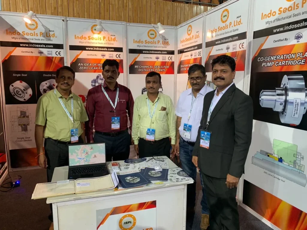 Five members of the Indo Seals team standing at the stall in Goa